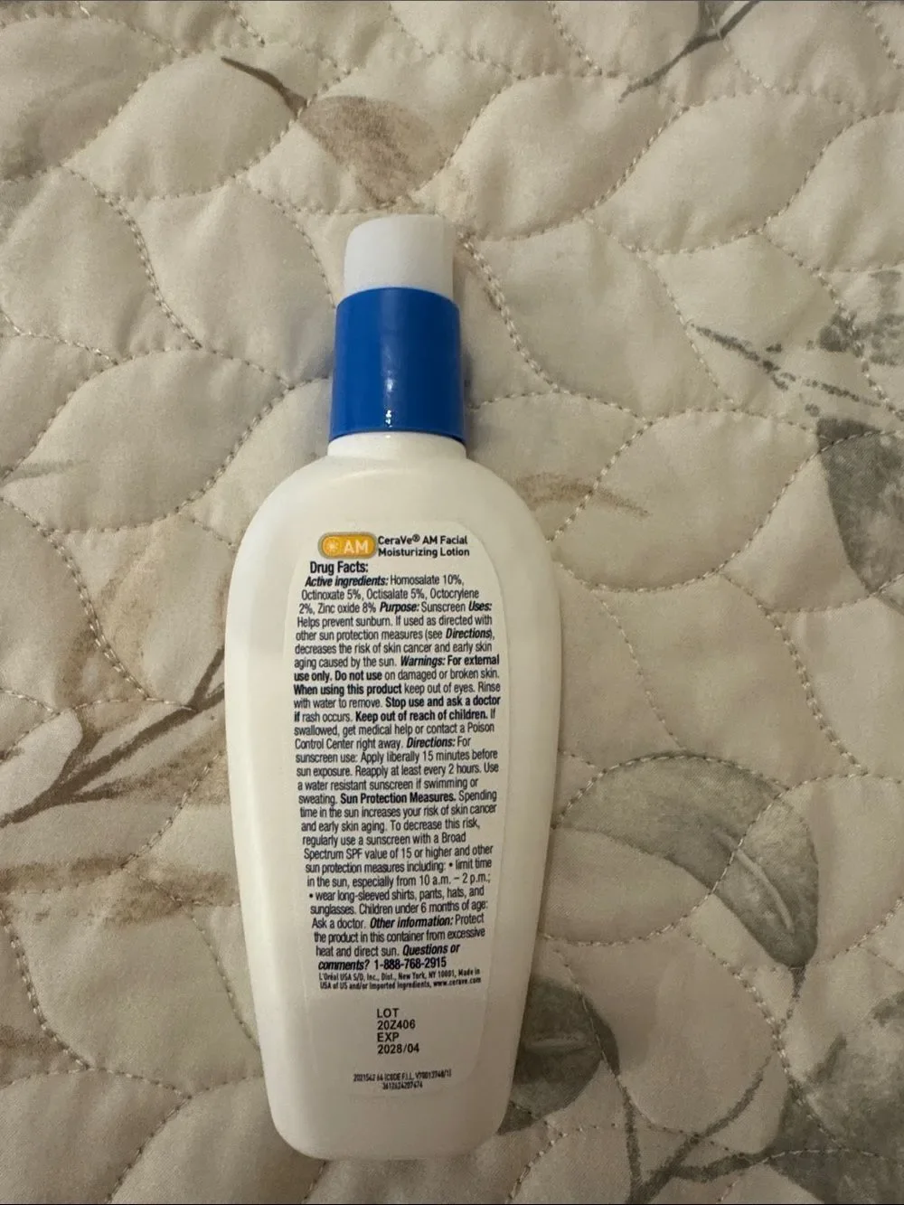 rave White Bottle with Blue Cap Daily Facial Sunscreen